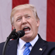 President Donald Trump speaks at a wreath-laying ceremony at the Tomb of the Unknown Soldier at Arlington National Cemetery on Memorial Day, May 29, 2017 in Arlington, Virginia (Photo by Olivier Douliery - Pool/Getty Images)